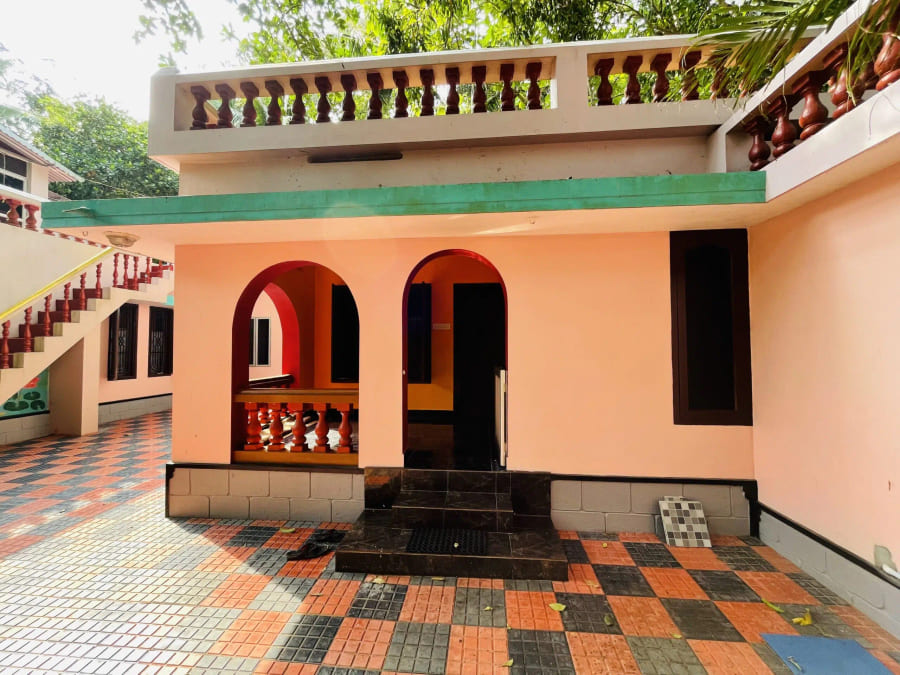Arched entrance to one of the ashram guest blocks