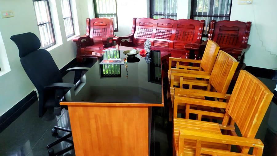 Reception desk and waiting area at the ashram office