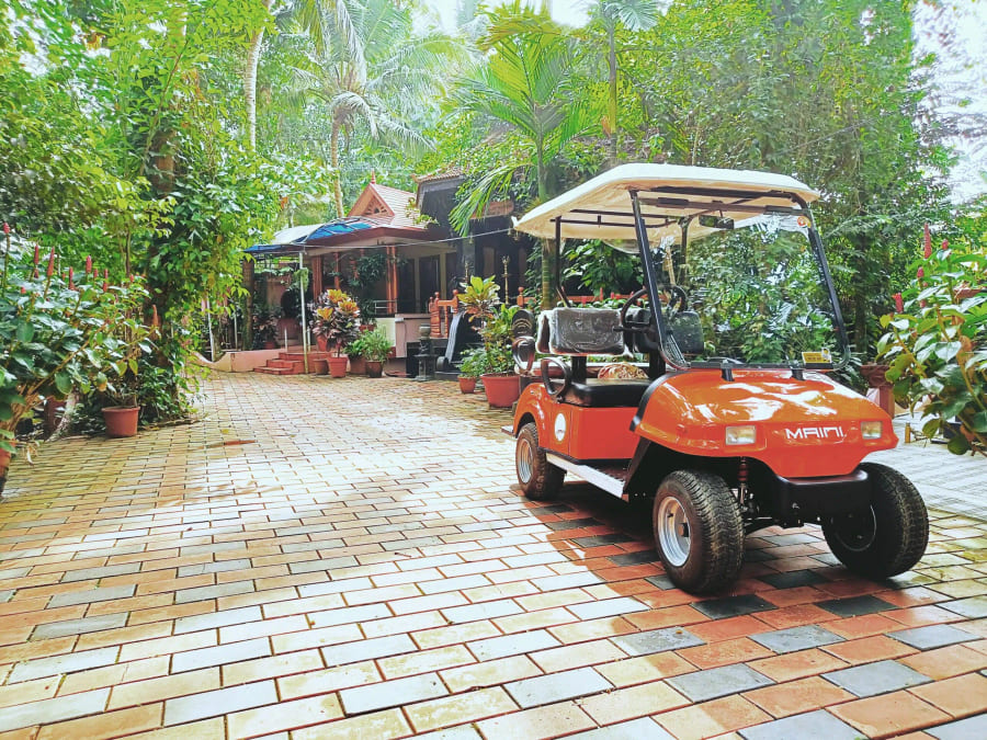 Tiled driveway and buggy at the entrance to the ashram
